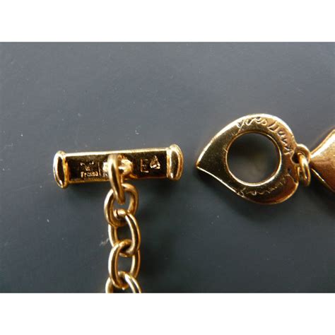 collier homme yves saint laurent|Collier tube en métal .